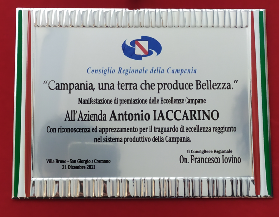 Award plaque from Regione Campania recognizing excellence in production